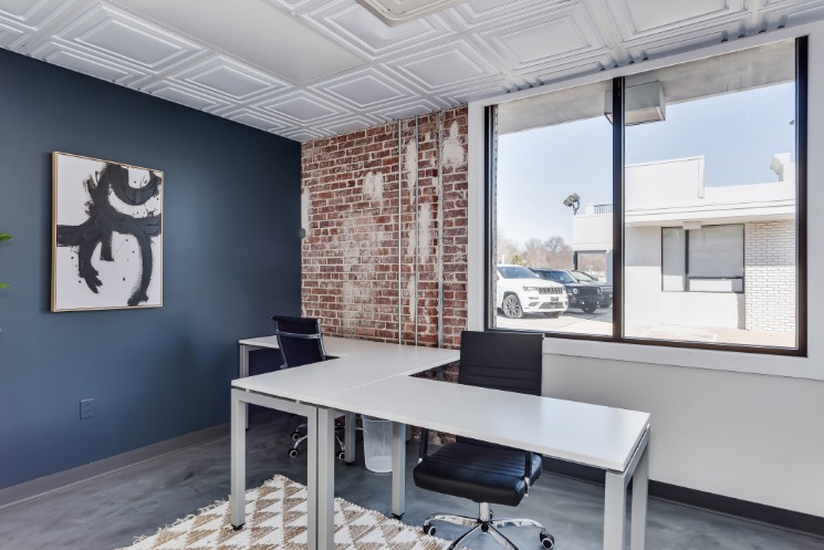 coworking desks and window view